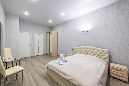 Кровать в номере Комфорт в отеле Фантазия на Московской