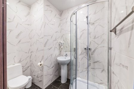 Санузел номера Комфорт в отеле Фантазия в Купчино