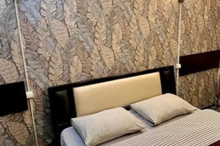 Двуспальная кровать в номере Стандарт в отеле Lite на Косыгина
